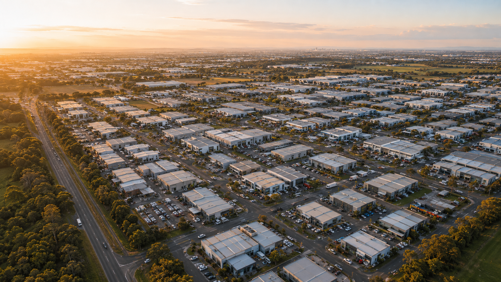 Aerial view across Keysborough industrial and commercial precincts at sunset